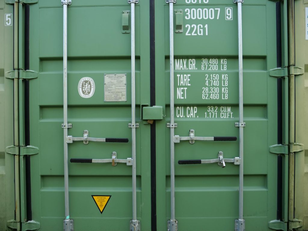 Shipping container with lockbox