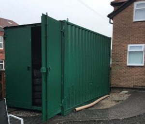 A modified 16ft shipping container being delivered to Aintree
