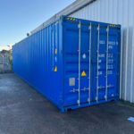 Side image of a new blue shipping container in Essex