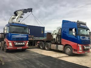 Container being unloaded from HIAB lorry