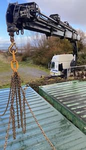 HIAB lorry delivering container