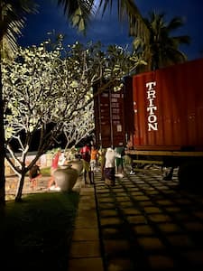 Image of people unloading a container