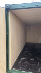 Inside a plywood & insulted container