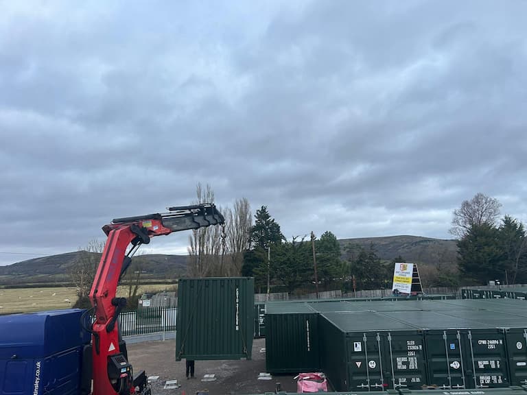 Shipping container on a HIAB lorry