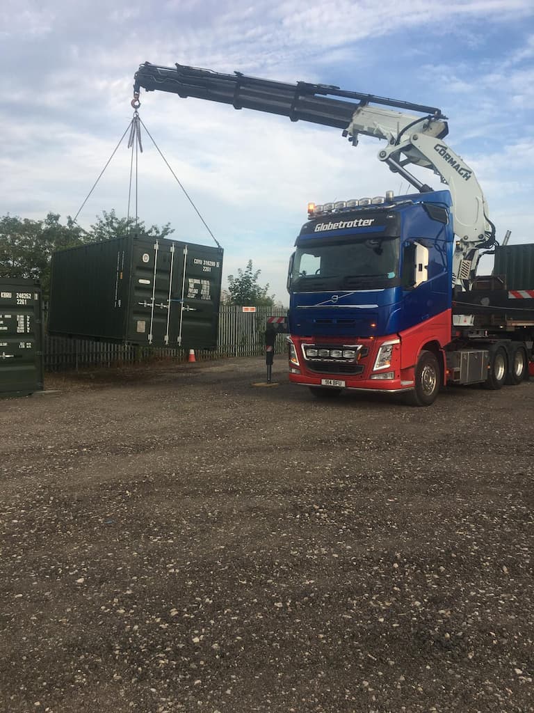 container being delivered to a self storage site