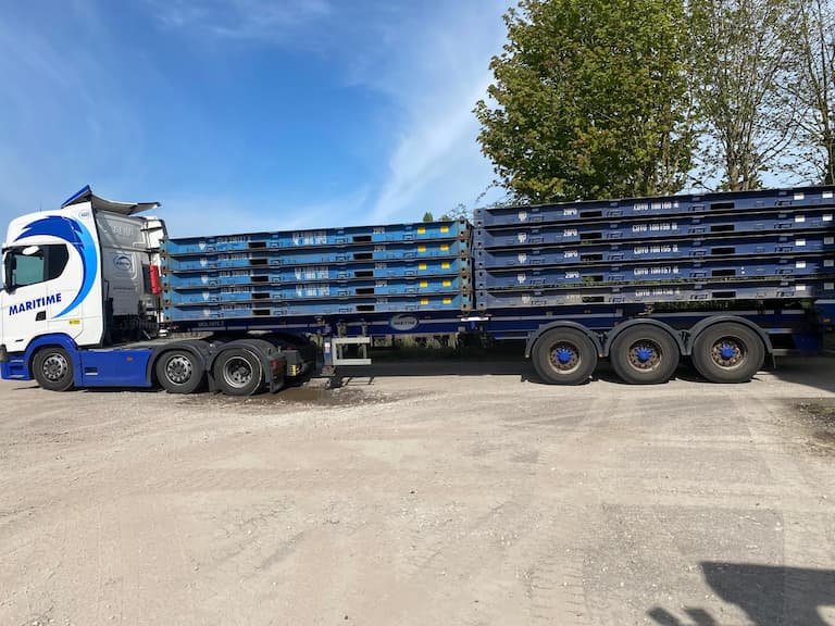 Platform flat containers on a HIAB lorry
