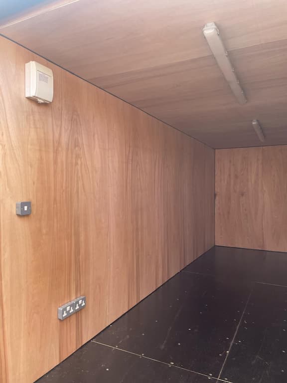 Container fitted with electricals