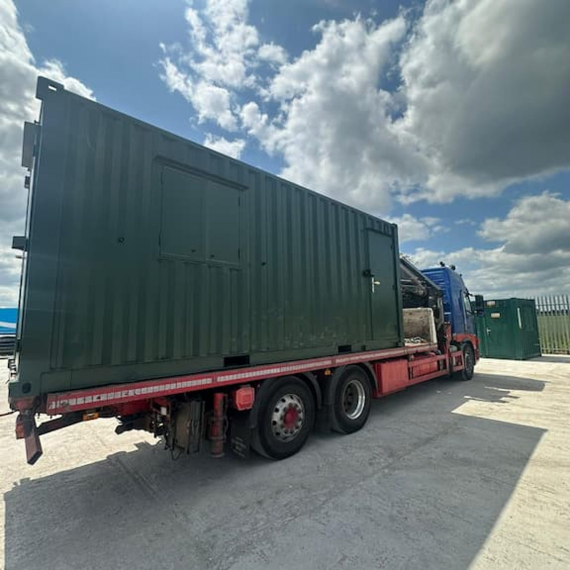 Cabin container being delivered on HIAB lorry