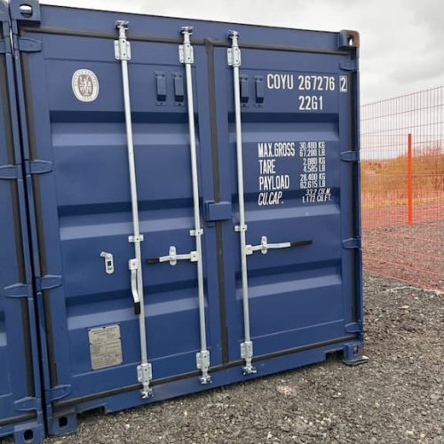 Blue 20ft shipping container at a self storage site