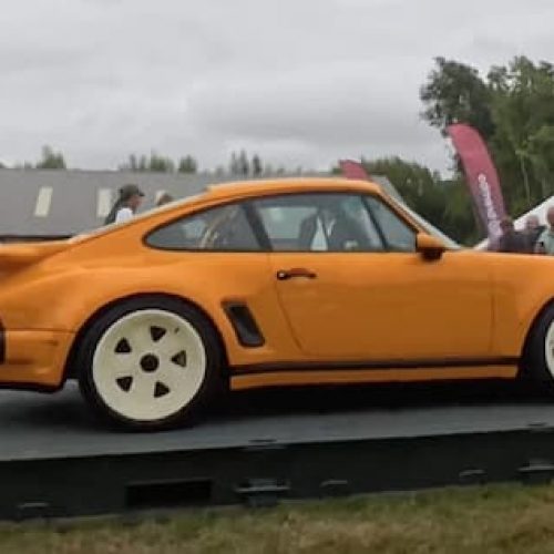 Porsche on a platform flat